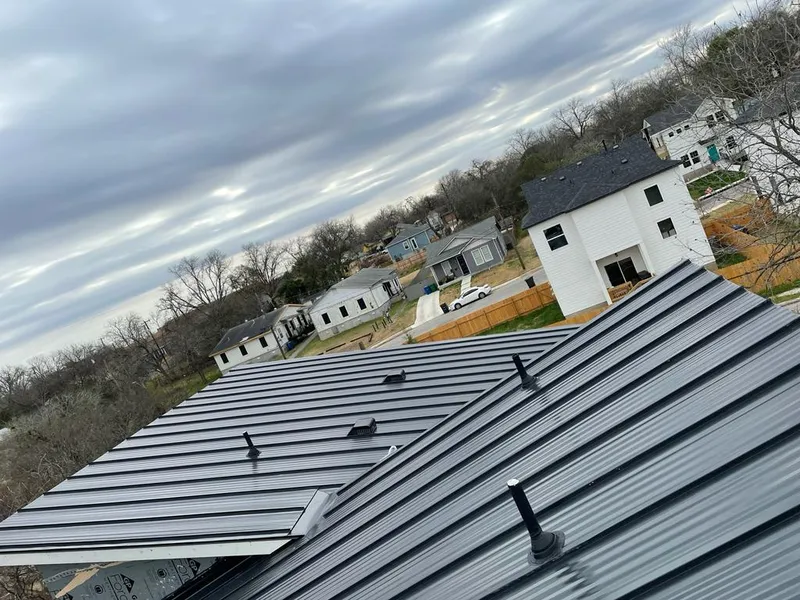 Standing seam metal roof panels with vents for Skylight Repair in West Park
